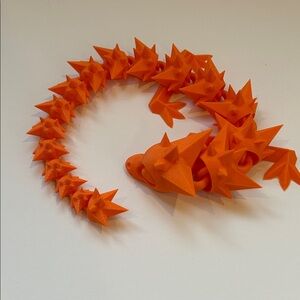 Orange Spiky 3D printed dragon